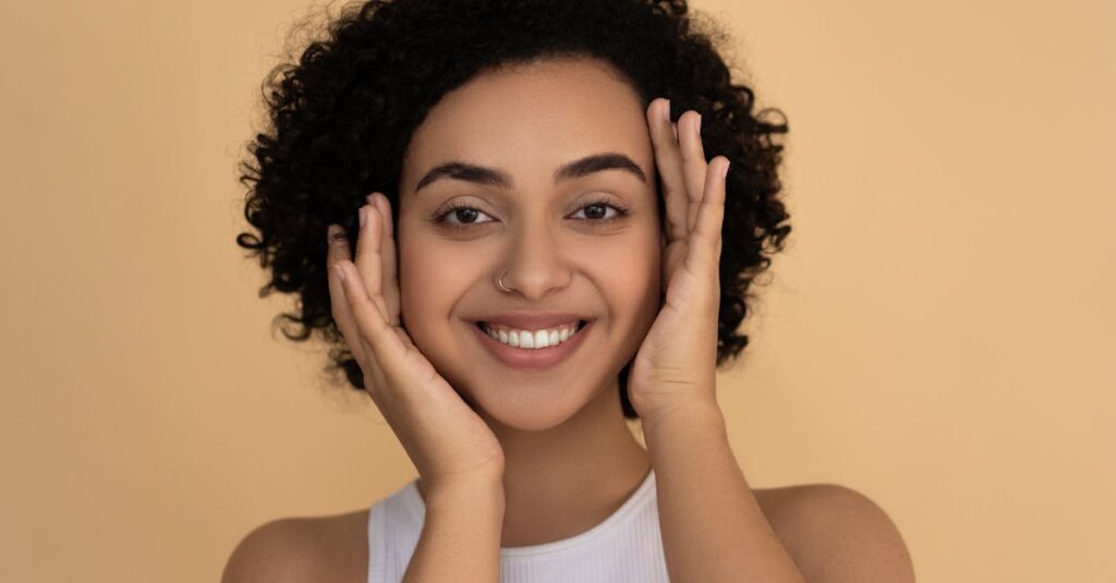 Close-up of a woman with natural skin texture embracing her beauty.