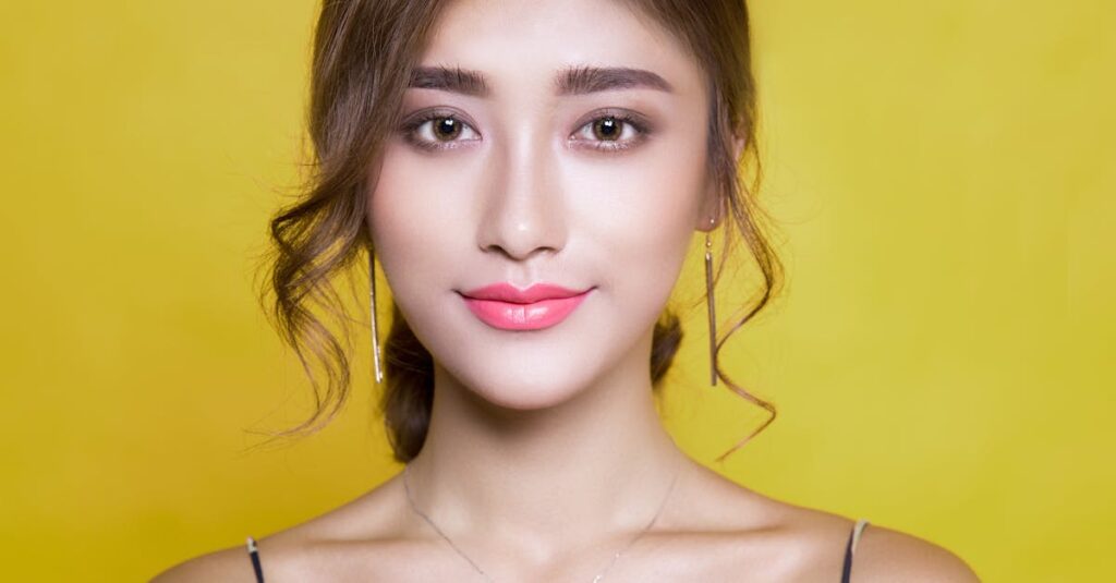 A woman with clear, glowing skin and soft makeup, representing the benefits of a committed skincare routine.