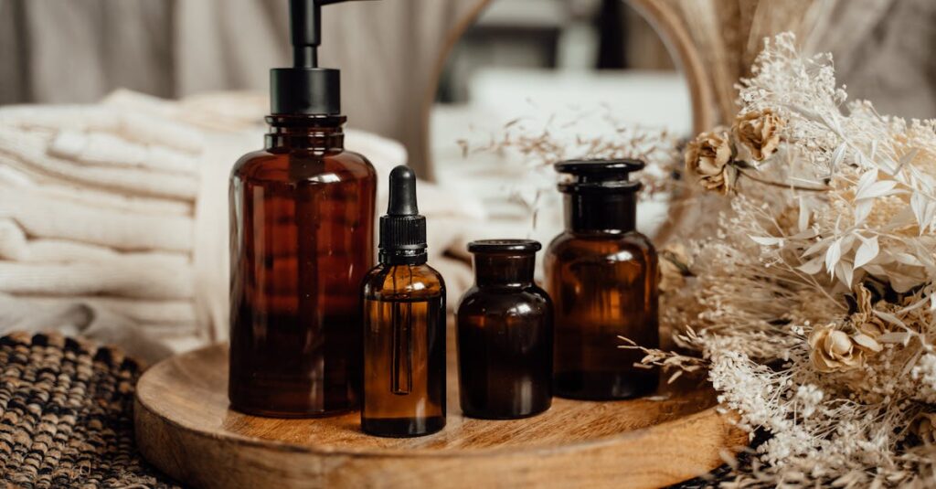 A collection of amber glass bottles containing natural acne remedies like grass-fed beef tallow for skincare benefits.
