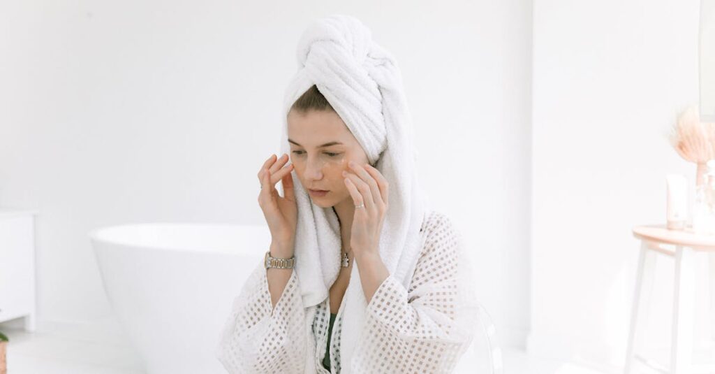 Woman in towel doing skincare routine for oily skin